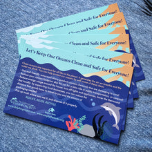 Load image into Gallery viewer, Let&#39;s keep our oceans clean educational postcard front side dolphin project
